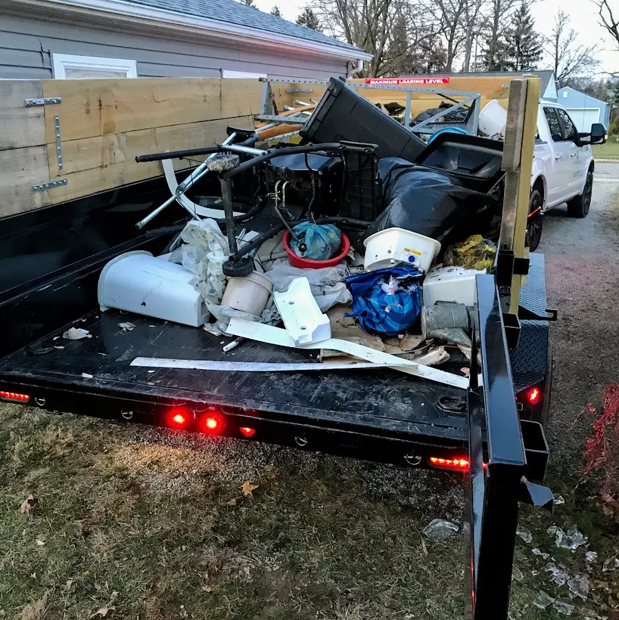 Roll-off dumpster delivered to a residential driveway in Bergenfield