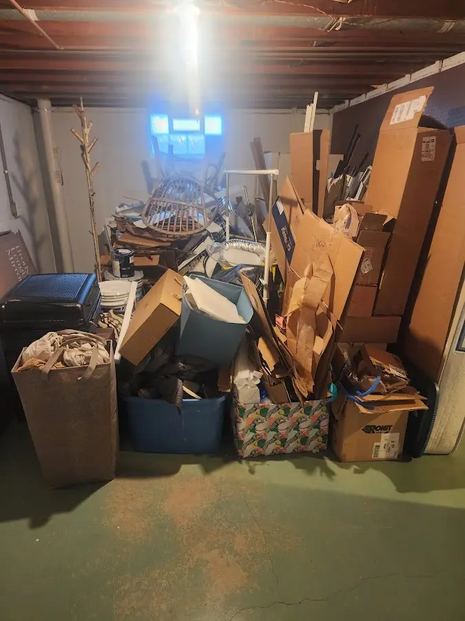 Roll-off dumpster container at job site for Cleanout Dumpster Rental in Bergenfield